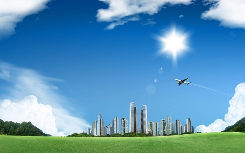 Airplane Flying over City — Blue