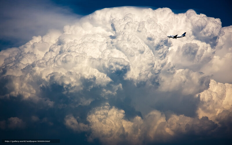 Airplane Flying over Clouds — White