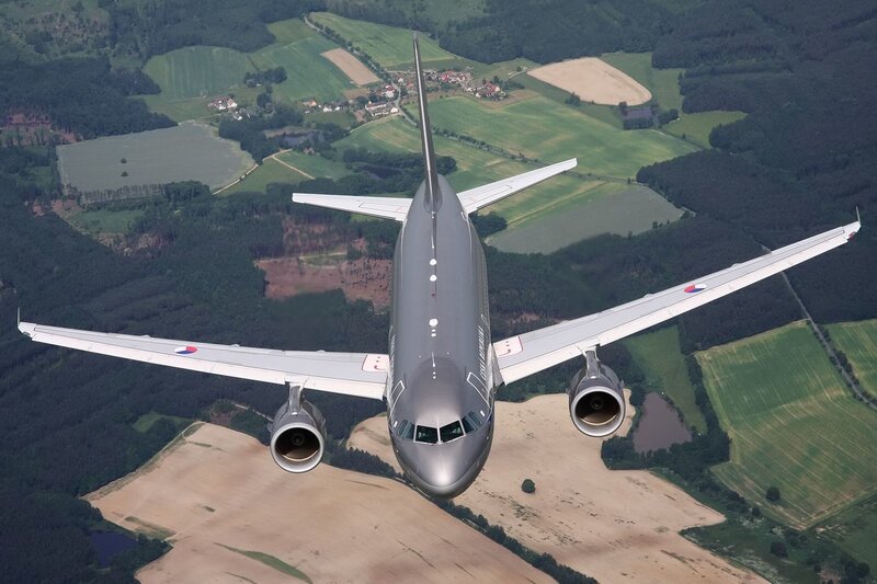 Airplane flying over countryside