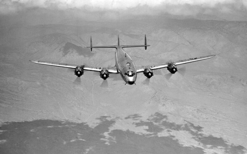 Airplane Flying over Desert — Black
