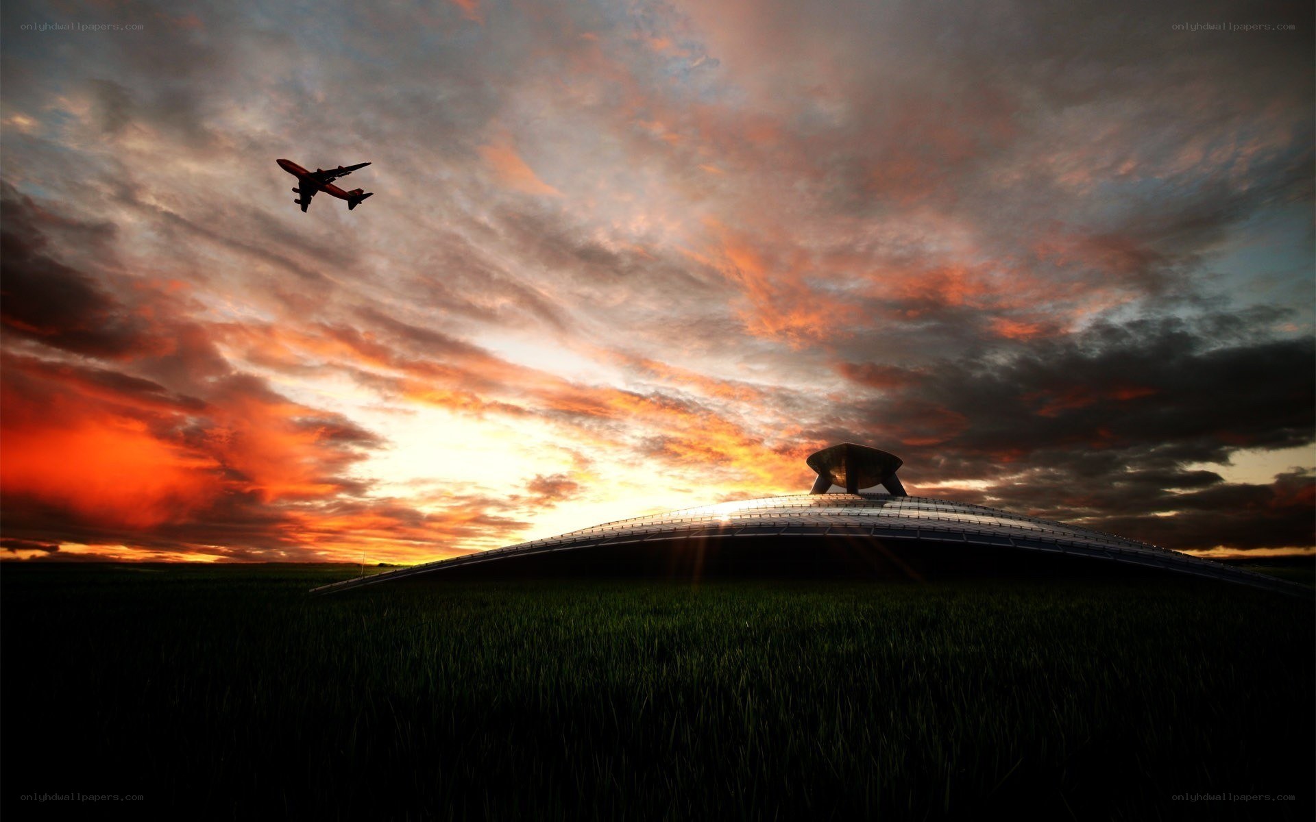 Airplane flying over modern building