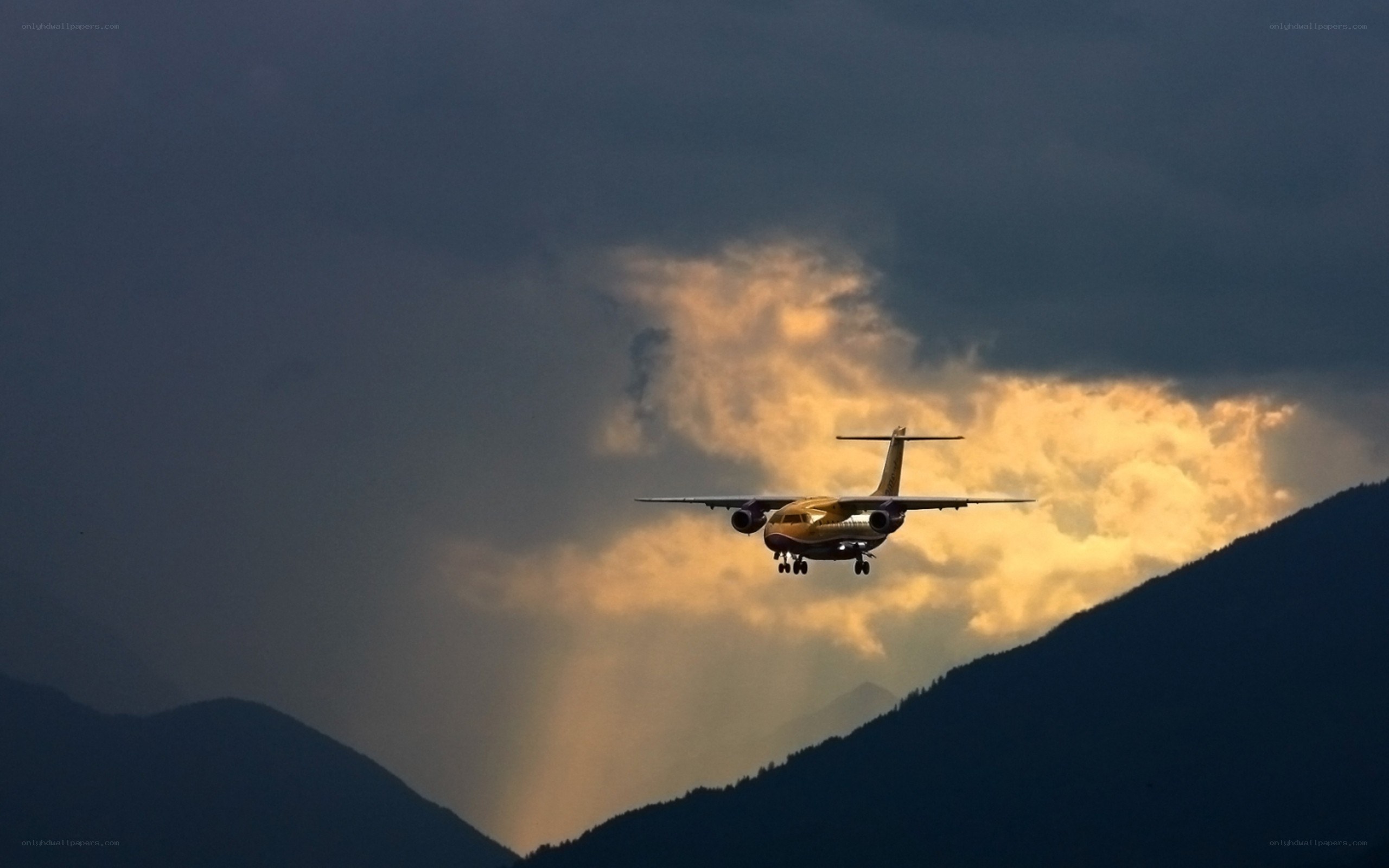Airplane flying over mountains