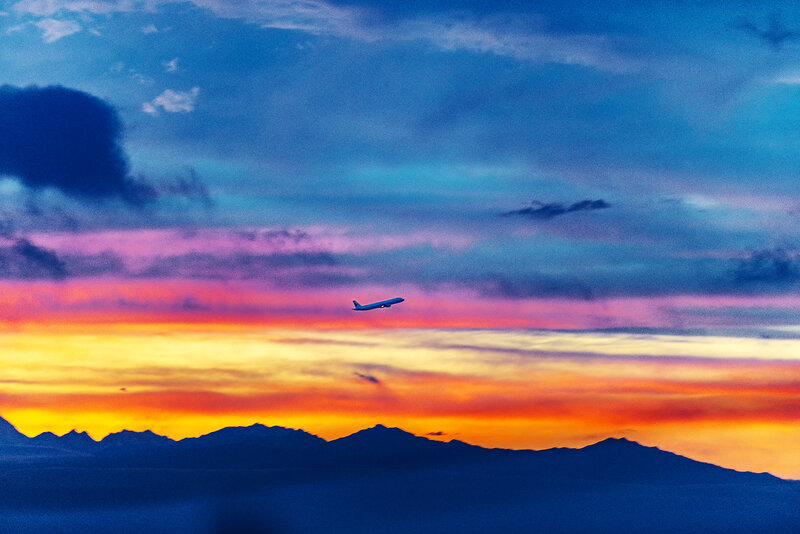 Airplane Flying over Mountains — Blue, Dramatic, Sunset