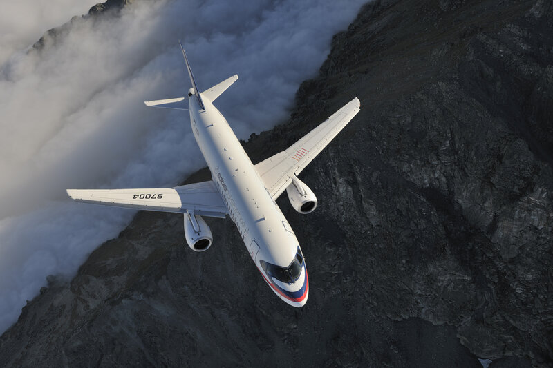 Airplane Flying over Mountains — White, Dramatic