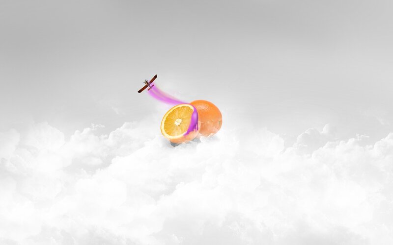 airplane flying over oranges