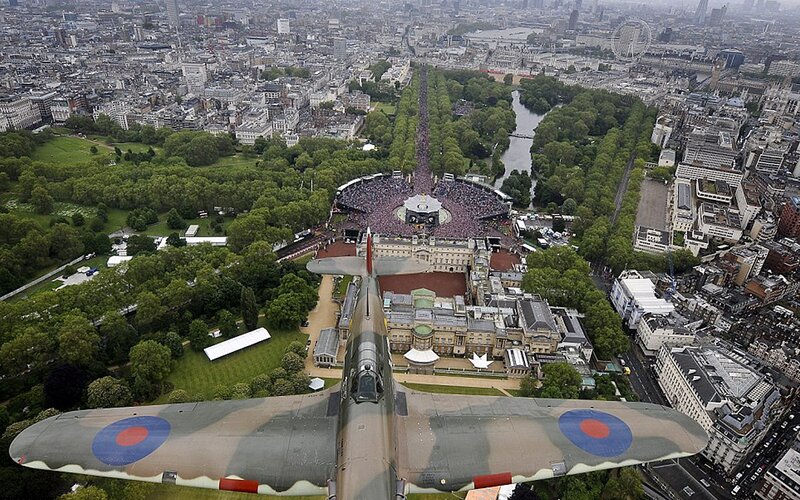 Airplane Flying over Palace