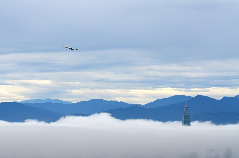 Airplane flying over Taipei