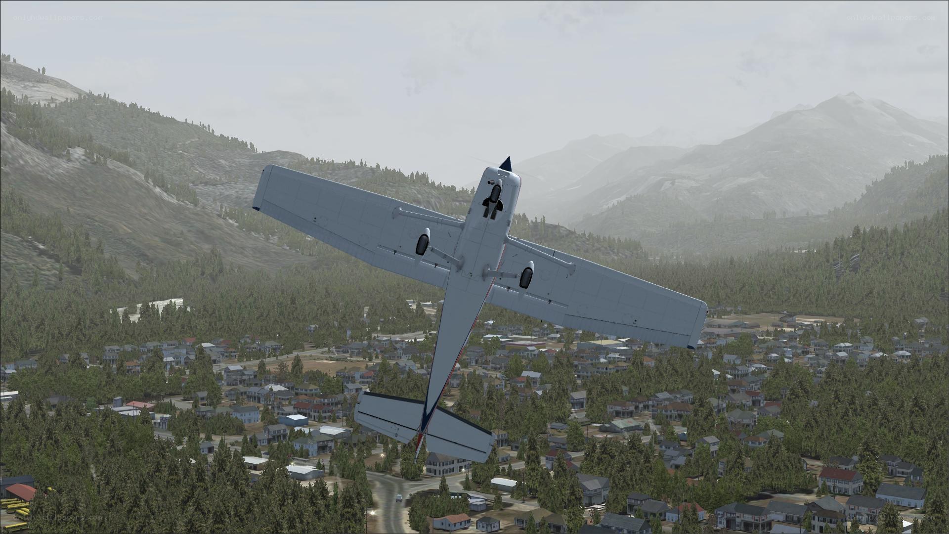 airplane flying over town