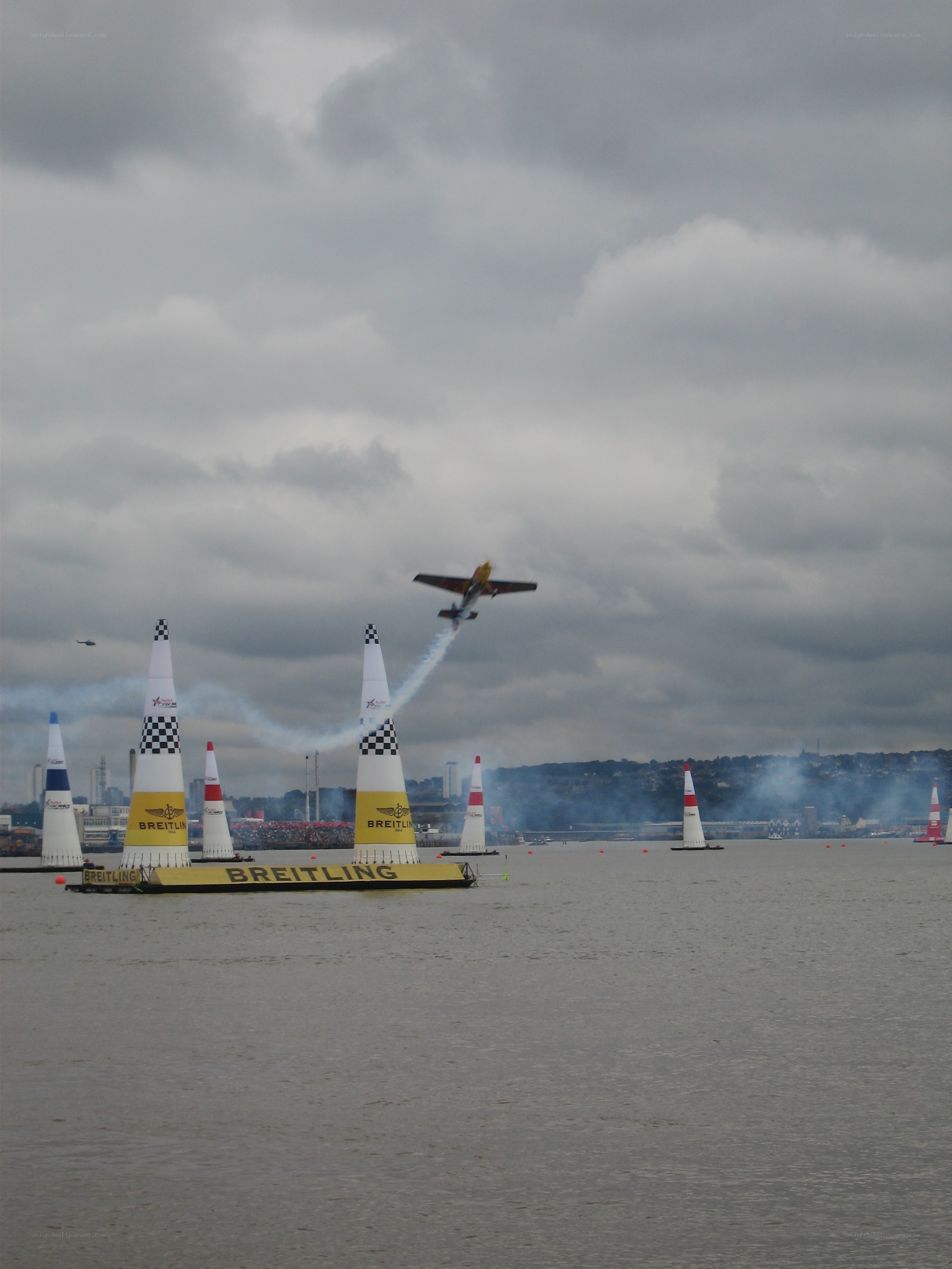 Airplane flying over water course