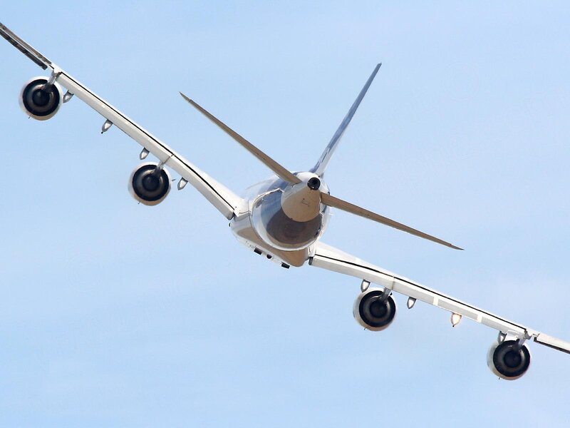 Airplane Flying Overhead — Blue, Calm, Afternoon