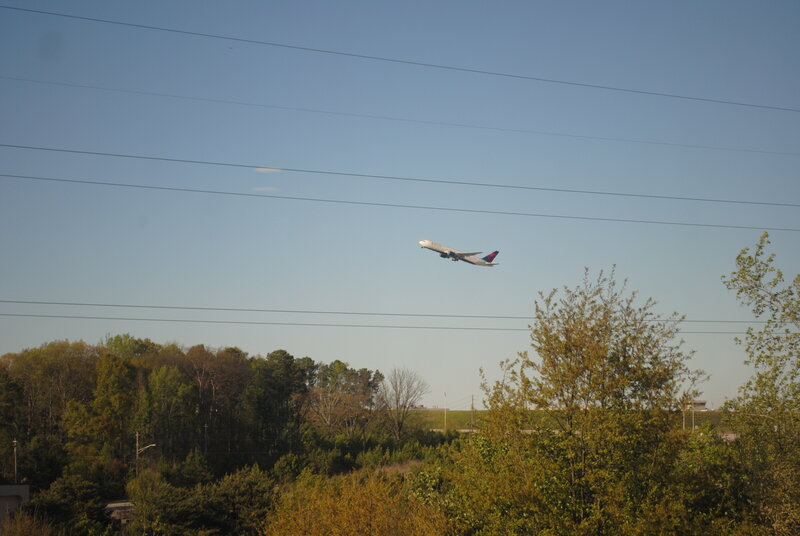 Airplane Flying Overhead — Blue, Calm