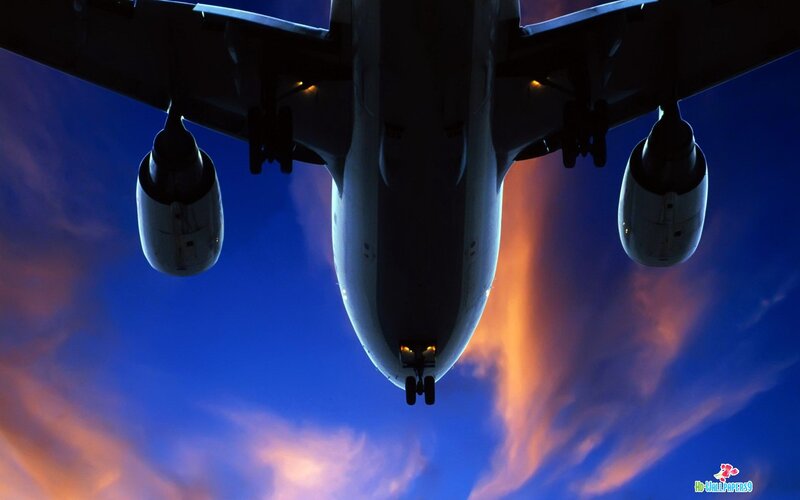 Airplane Flying Overhead — Blue, Dramatic, Sunset