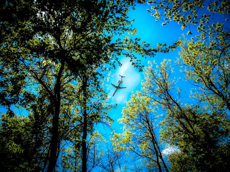 Airplane Flying Overhead — Blue, Serene, Spring