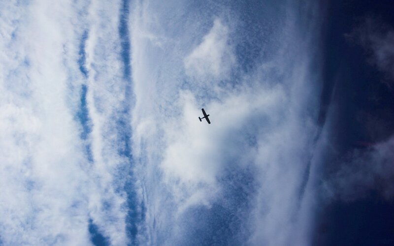 Airplane flying through clouds