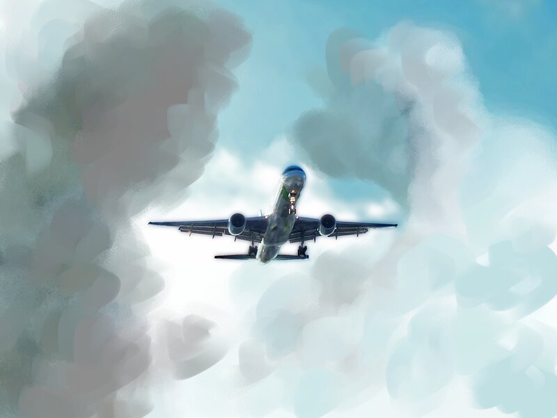 airplane flying through clouds