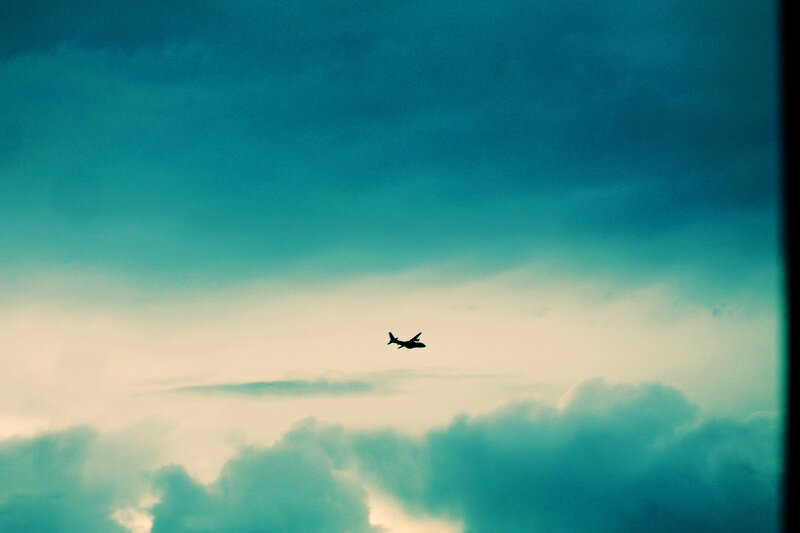 Airplane flying through clouds