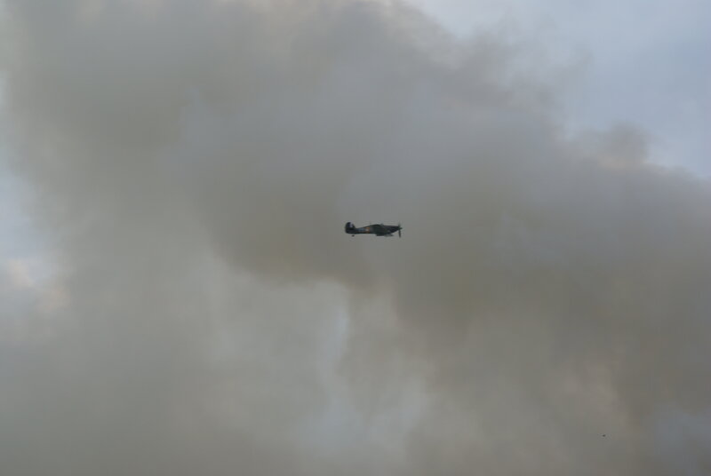 airplane flying through clouds