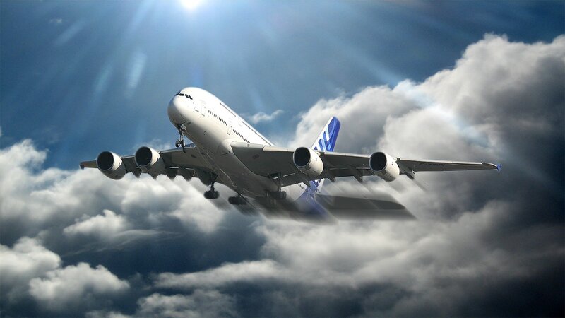 Airplane Flying Through Clouds — White, Dramatic