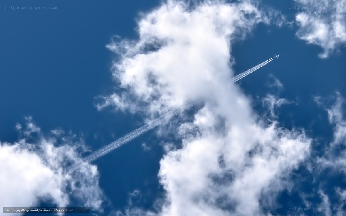 Airplane flying through clouds