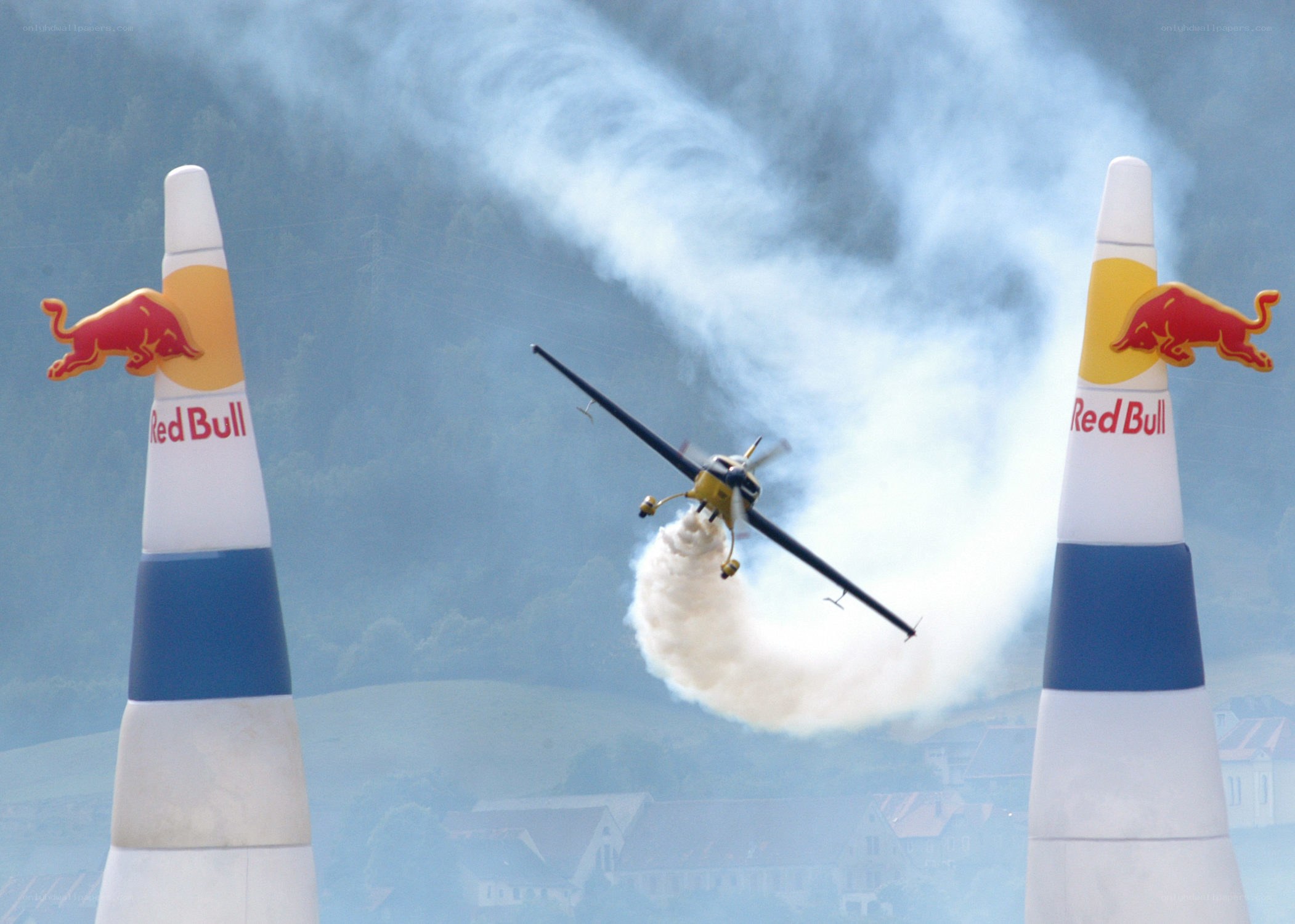 Airplane flying through Red Bull gates