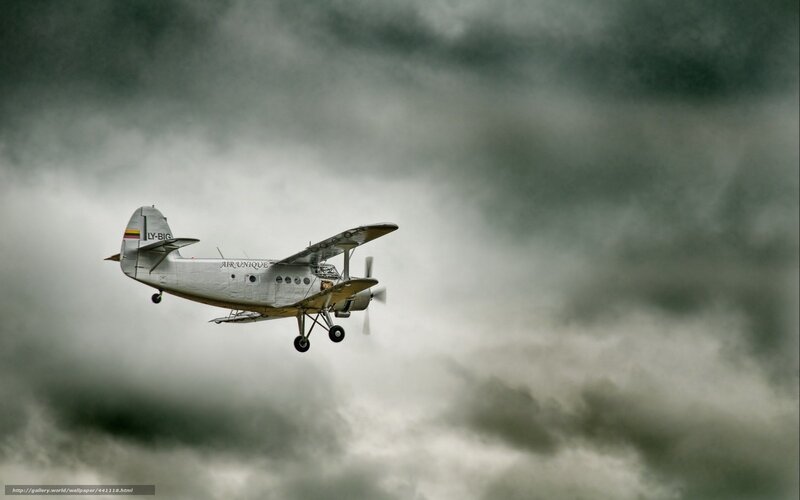 Airplane flying through storm clouds