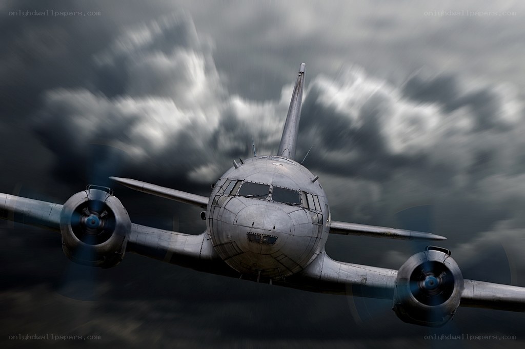 Airplane flying through storm clouds