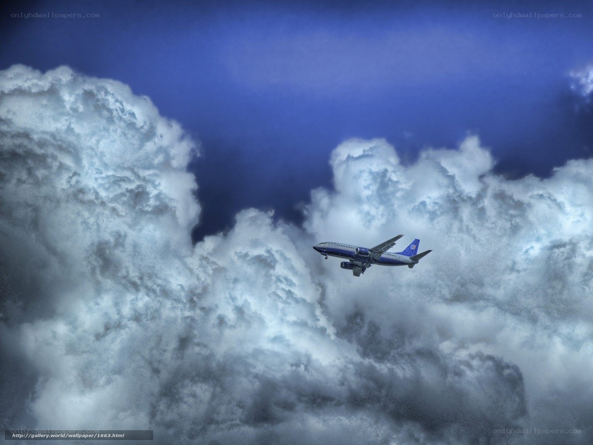 Airplane flying through storm clouds