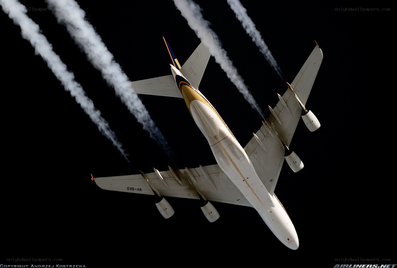 Airplane flying with smoke trails