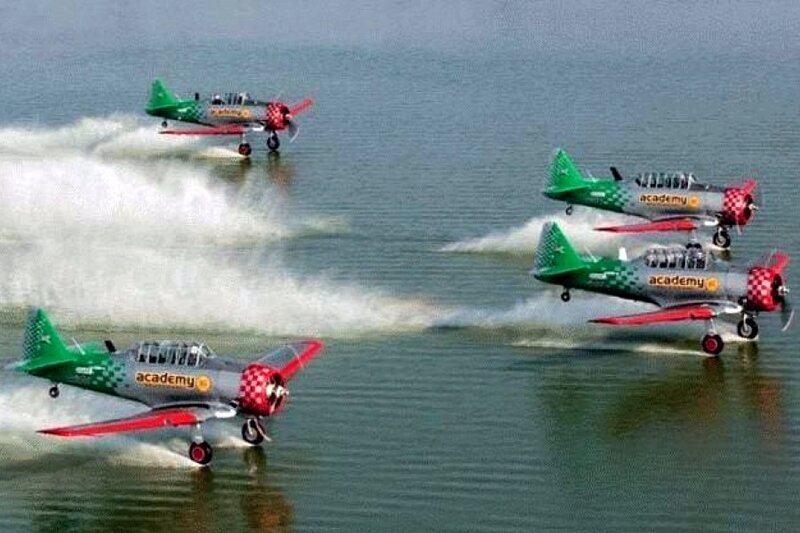 airplane formation over water
