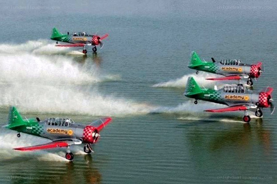 airplane formation over water