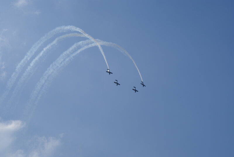 Airplane formation with smoke trails