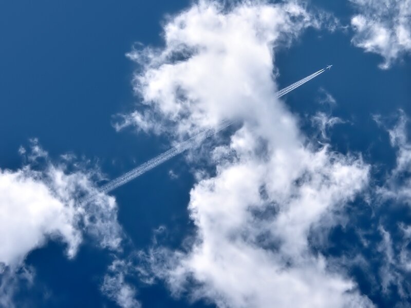 Airplane in Blue Sky — Serene, Afternoon, Photograph, Clouds, Contrail