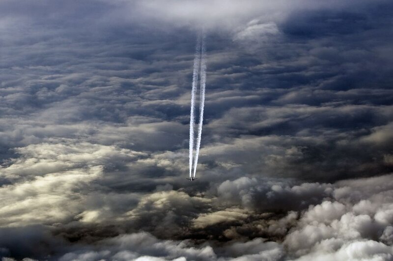 Airplane in Clouds — Gray, Dramatic