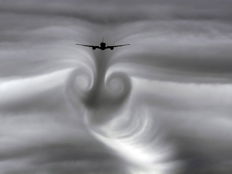 Airplane in Clouds — Gray