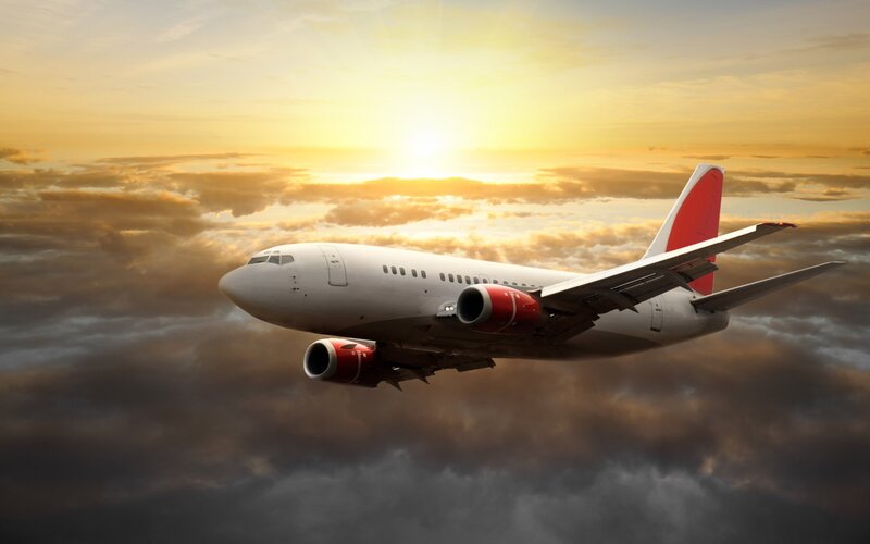 Airplane in Clouds — White, Dramatic