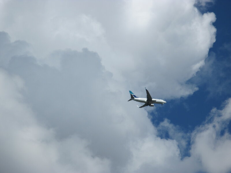 Airplane in Cloudy Sky — Blue, Dramatic, Afternoon, Photograph