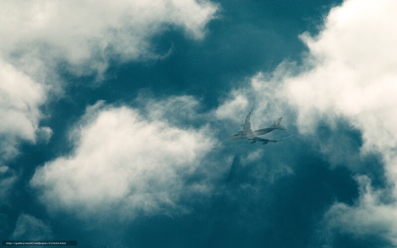 Airplane in Cloudy Sky — Blue, Dramatic, Photograph