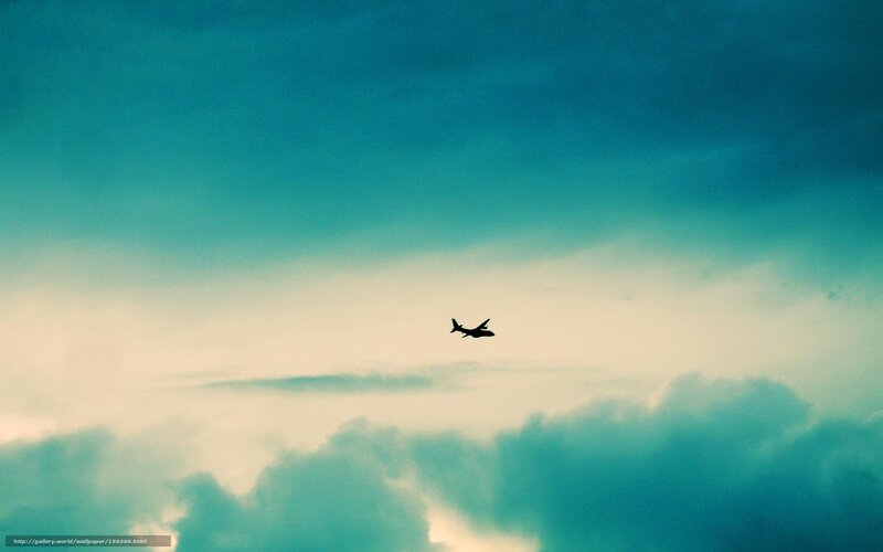 Airplane in Cloudy Sky — Blue, Serene, Sunset