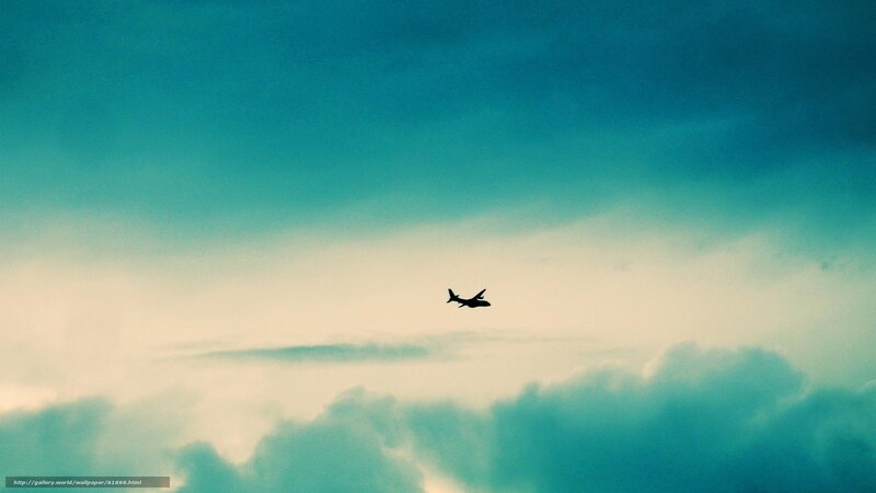 Airplane in Cloudy Sky — Blue, Serene