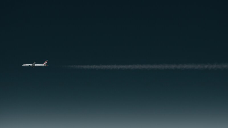 Airplane in Dark Sky
