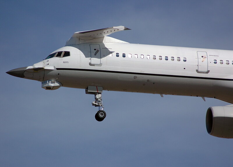 airplane in flight against blue sky