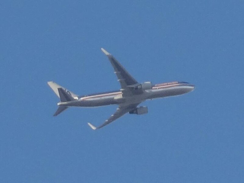 Airplane in Flight — Blue, Calm, Photograph