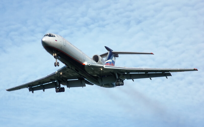 Airplane in Flight — Blue, Calm