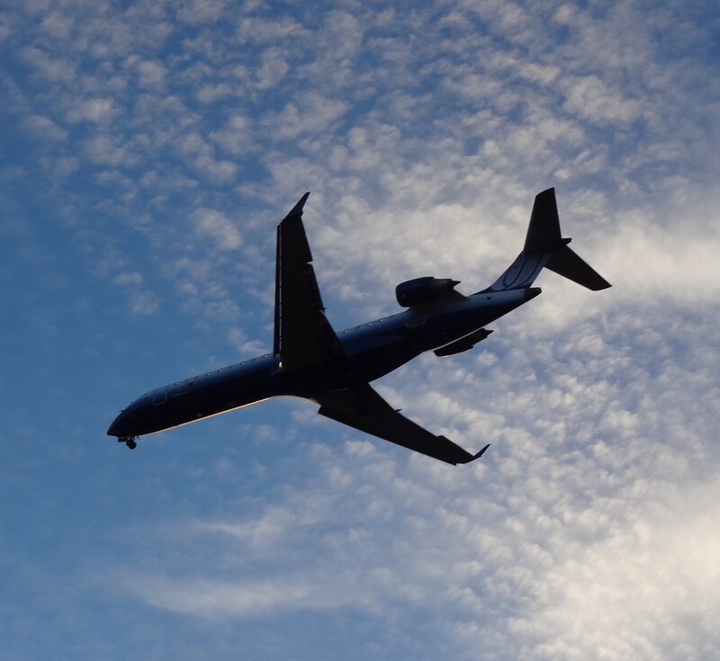 Airplane in Flight — Blue, Dramatic, Afternoon