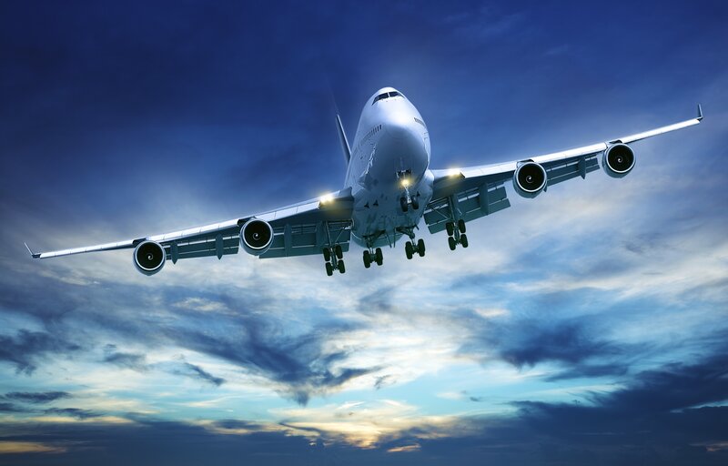 Airplane in Flight — Blue, Dramatic, Sunset, Photograph, Sky, Clouds, Landing Gear, White, Gray
