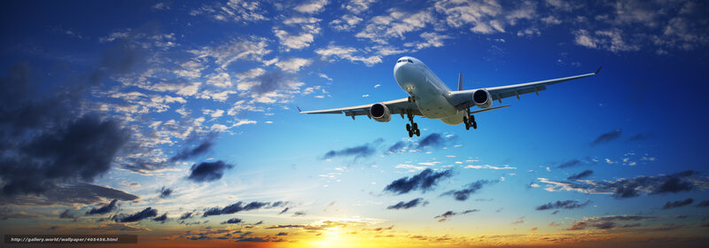 Airplane in Flight — Blue, Dramatic, Sunset, Photograph, Sky, Clouds