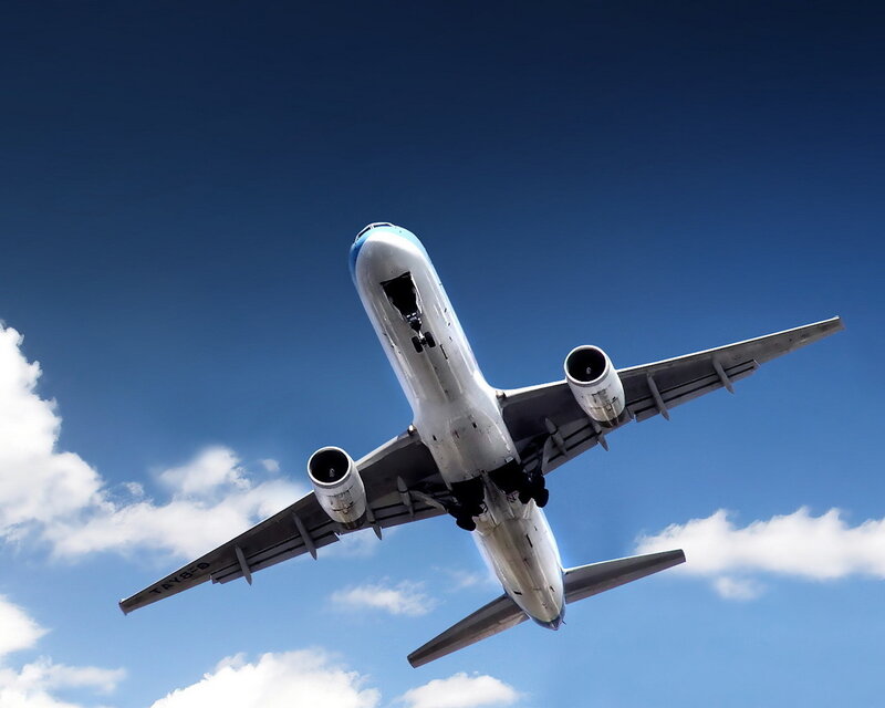 Airplane in Flight — Blue, Dramatic