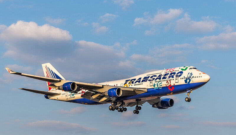 Airplane in Flight — Blue, Dynamic, Afternoon, Photograph, Clouds, Sky