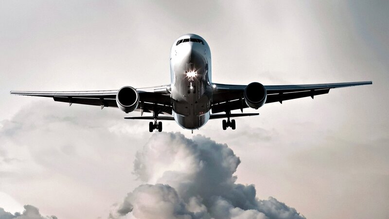 Airplane in Flight — Gray, Dramatic, Photograph