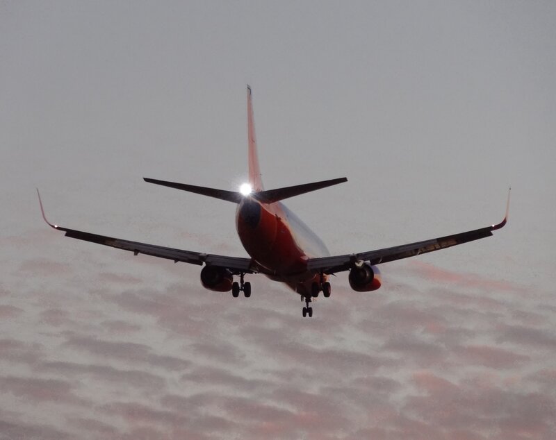 Airplane in Flight — Gray, Dramatic, Sunset, Photograph, Clouds